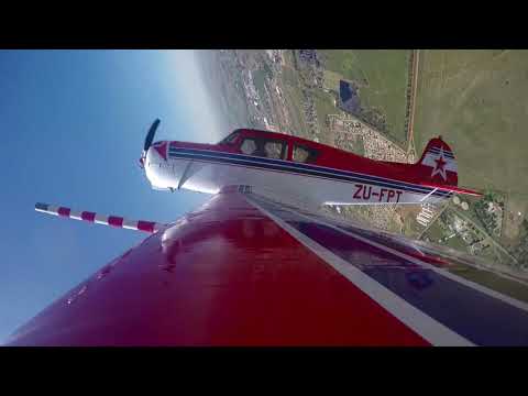Flying aerobatics in a Yak 18T