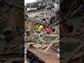Woman rescued from rubble of home after destructive tornado - Video