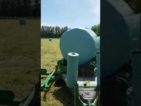 McHale wrapper on a beautiful day. #newholland #mchale