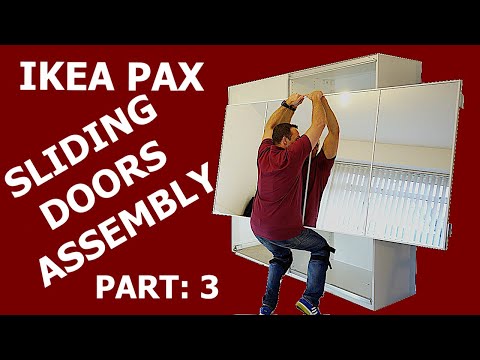Part of a video titled IKEA PAX WARDROBE sliding doors assembly PART: 3 - YouTube