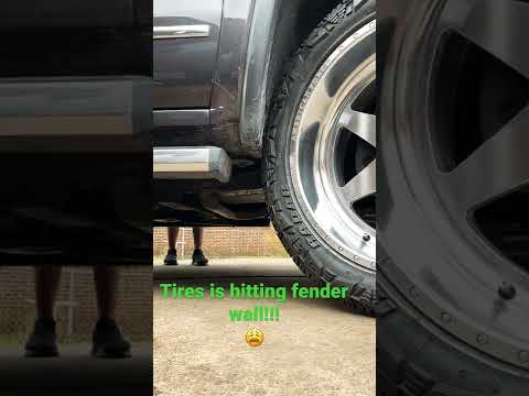 2016 GMC Sierra denali 2” front lift on 22x12 33’s tires (tire hit the rear fender part)