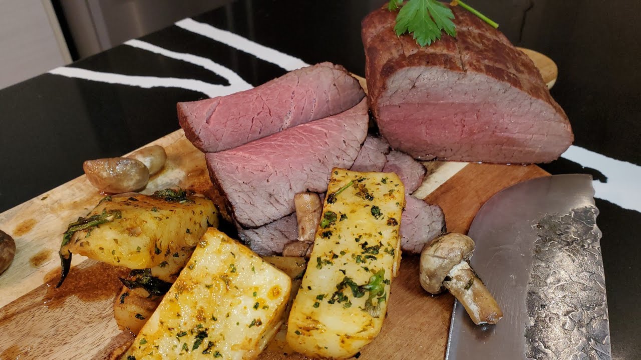 Watch video Recette d'un délicieux rôti de bœuf , avec sa pomme de terre fondante Repas complet! Recette d'un délicieux rôti de bœuf , avec sa pomme de terre fondante Repas complet!