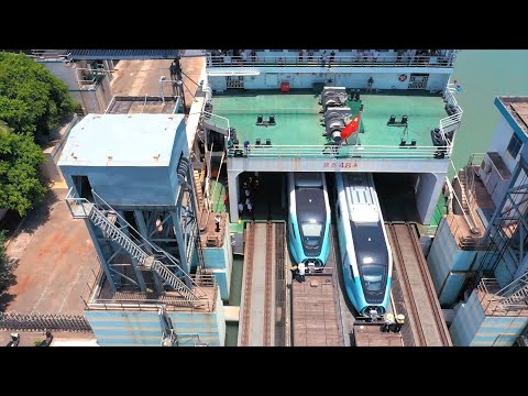 How train takes ferry to cross strait in south China?