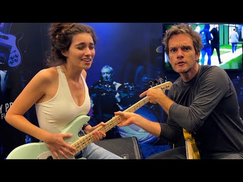 She Gets Her First Bass Lesson