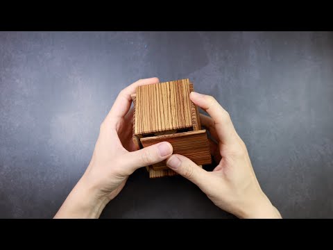 648 steps to solve this amazing puzzle! Super Cubi by Hiroshi Iwahara of Karakuri Creation Group