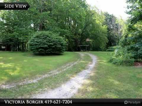 3+ acre wooded hideaway in Berlin Heights!