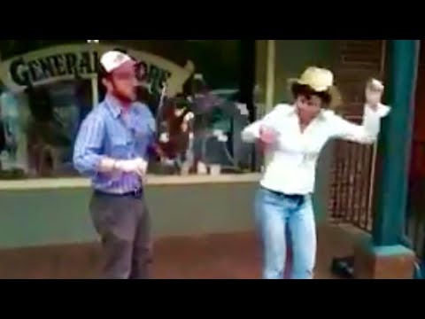 Miss Moonshine buckdancing so fast she knocks fiddle out of Chris Ryan's hands (OOPS!)