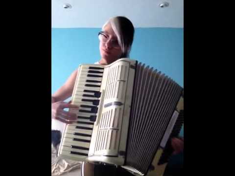 Ali plays the happy wanderer on accordion