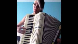 Ali plays the happy wanderer on accordion