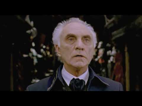 Storm-lit exterior shot from the trailer matching low-brass and organ pulses in the score