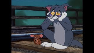 Tom and Jerry sit on the tracks