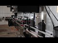 Exit View of Bottle Capper - Four-Station Spindle Capping Machine