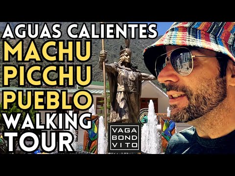 Passeio a pé completo em 4K por Águas Calientes, também conhecida como Machu Picchu Pueblo. Muitos cães e fontes termais. Peru