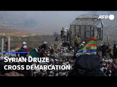 Syrian Druze cross demarcation line into Israeli-annexed Golan Heights | AFP