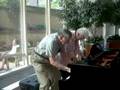Mayo Clinic atrium piano, charming older couple…
