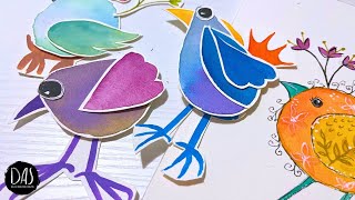 I reach for my paintbrush to bring my whimsical bird creations to life. So join me and build birds!