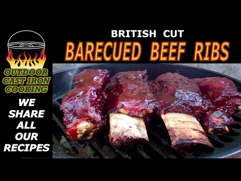 British Cut Beef Ribs Barbecued In A Camp Oven