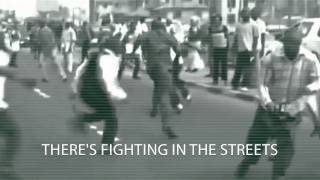 ManLiftingBanner - FIGHTING IN THE STREETS