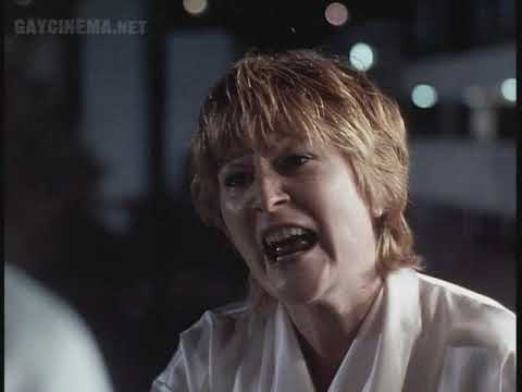 1996 trailer still — Jamie and Ste by the Thamesmead flats, a Mama Cass tune in the air