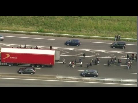 Migrants Jump on Lorries at Calais as Port Workers Strike.