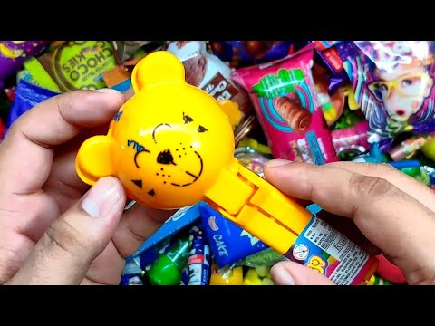 Lollipop inside teddy bear toy candy, some interesting candies