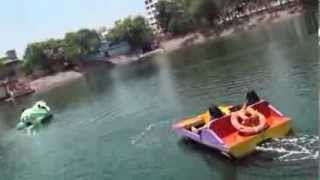 preview picture of video 'Girls enjoying paddle boating with their family'