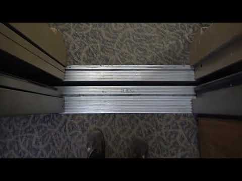 Tastefully Modernized Otis Series 2 Hydraulic Elevators at 900 Executive Plaza in Mobile, AL.