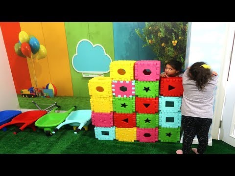Masal and Öykü Wants to Play Hide and Seek! kids knitted wall with colorful boxes