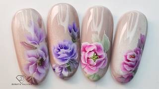 Cat eye nail art with advanced one stroke flowers. Trending spring floral cat eye nails.