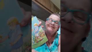 Bella's Omi reads Hugs by Robert Munsch
