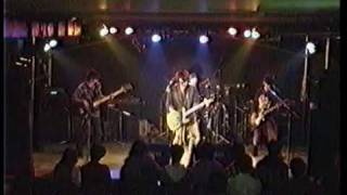 Izzy Stradlin &amp; the Ju Ju Hounds / &quot;Cuttin&#39; The Rug&quot; - cover 01