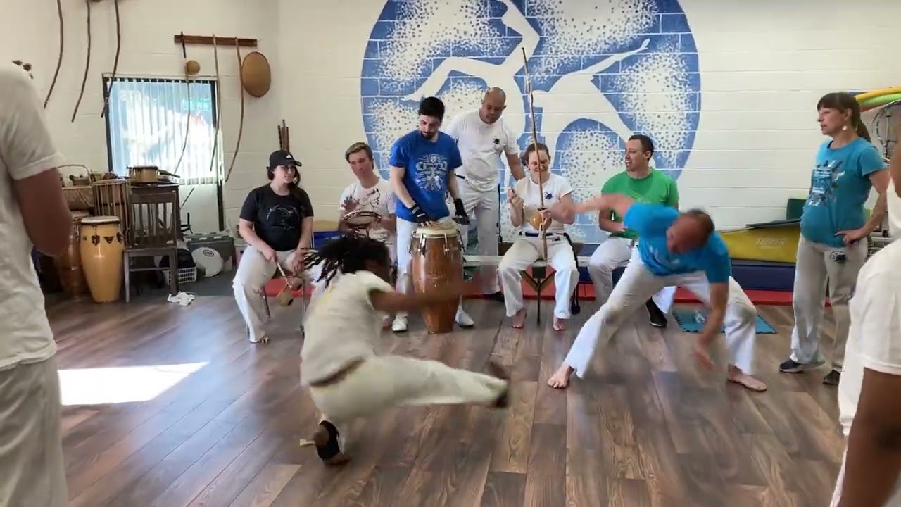 An example of the game of capoeira at our studio