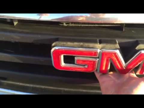 How to take off GMC grill emblem