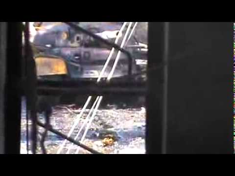 تدمير دبابة تي 72 بعد استهدافها من قبل كتيبة الفاروق في حي بابا عمرو في مدينة حمص