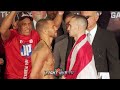 VASYL LOMACHENKO SHAKES HIS AT JOSE PEDRAZA WHO TRIES TO INTIMIDATE HIM AT WEIGH IN FACE OFF