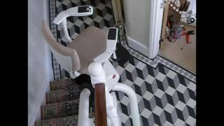 Curved Stairlift on triangular staircase to serve 3 levels