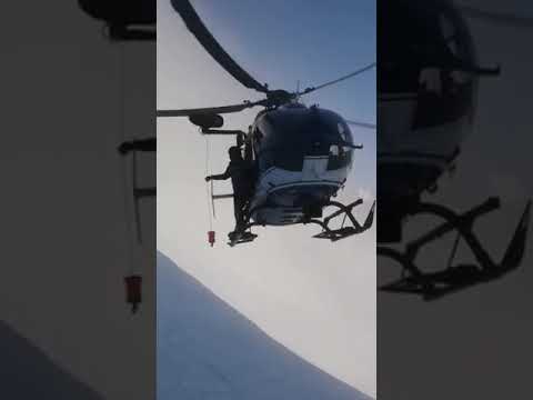 Watch This Amazing Helicopter Pilot Rescue Injured Skier From French Mountain