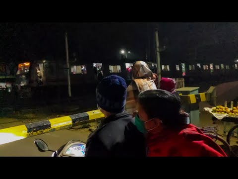 Heavy traffic at night: two high EMU train cross the Railgate at Devastated and furious speed