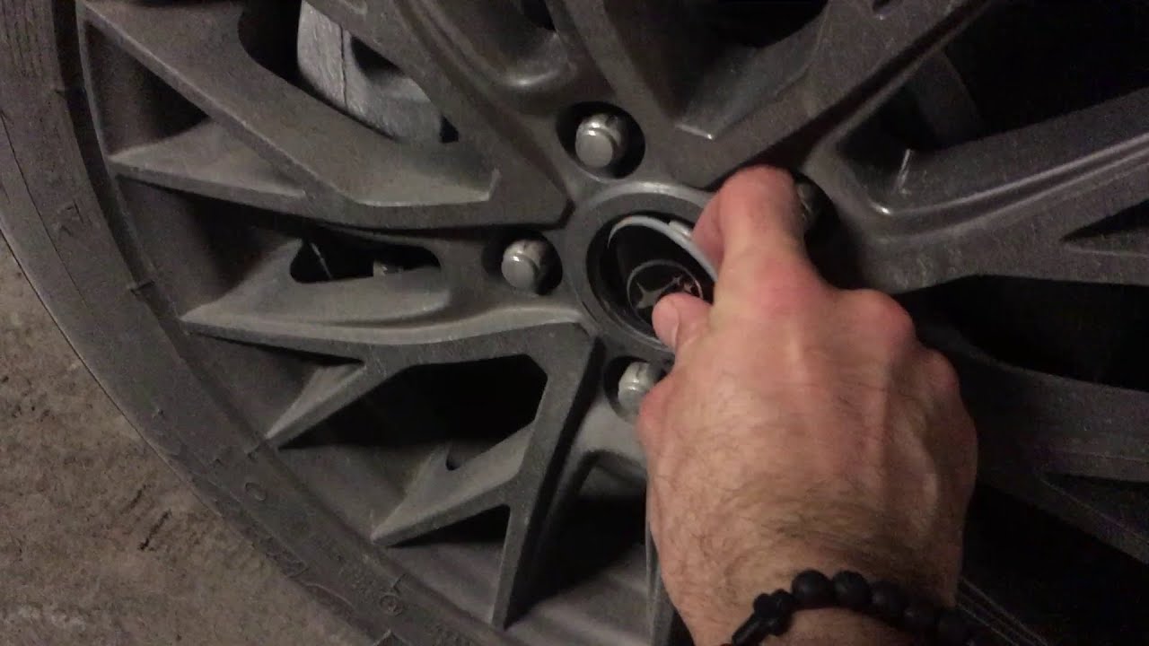 How to replace the generic center caps stickers on alloy wheels Step by step