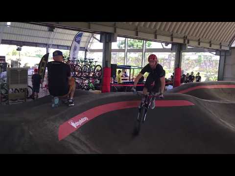 Adrien Loron gets airborne on the pump track at The Bike Playground