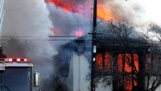 Two alarm fire burns vacant East Oakland landmark library