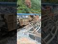Mountain train unloading coal- Good tools and machinery can increase work efficiency