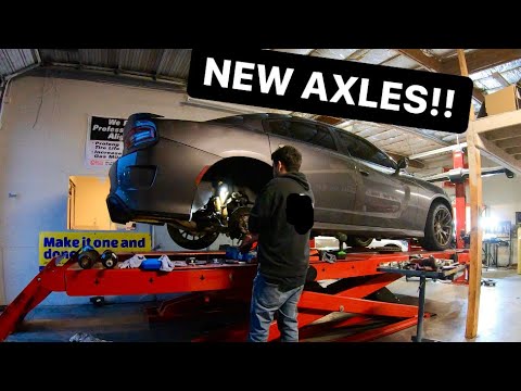 INSTALLING NEW REAR AXLES ON THE HELLCAT!!