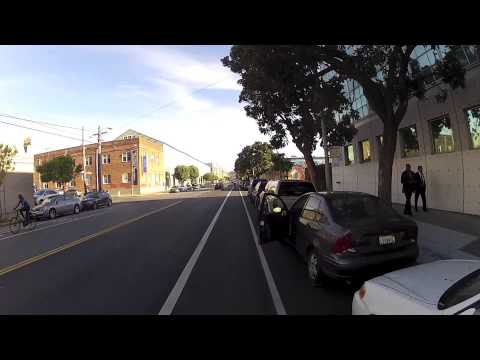 Driver opens door into bike lane