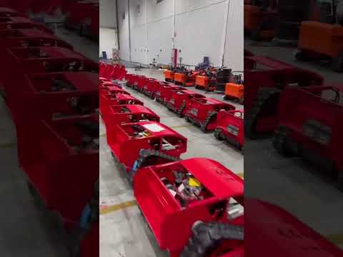 Factory visit — remote-controlled tracked mowers
