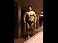 16 year old body builder flexing (4 weeks out)