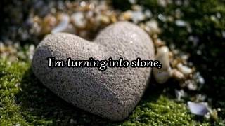 Turning to stone by Godsmack Lyric video