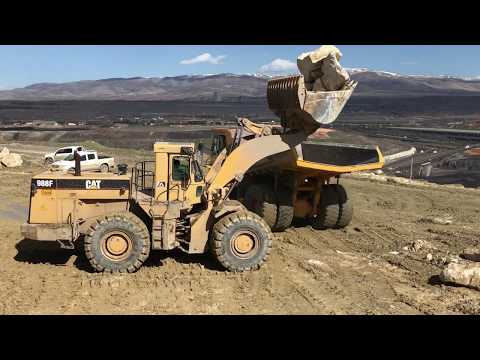 Caterpillar 988F Wheel Loader Loading Komatsu Dumpers - Labrianidis Mining Works