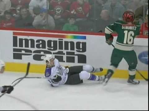 Brad Staubitz crunches Kyle Clifford