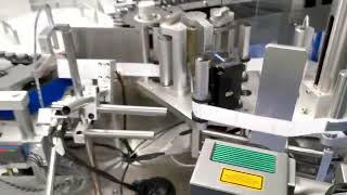CF30  CO2 flying laser marking on pharmaceutic label for date and batch number printing.
